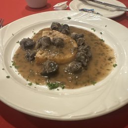 Escargot in a butter sauce Escargot in a butter sauce
