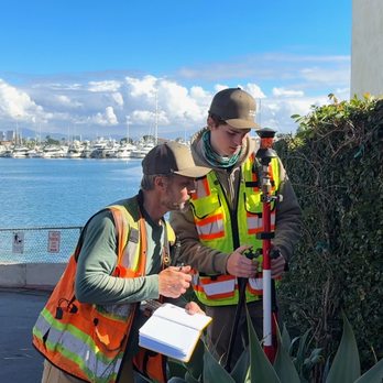 Pacific Coast Land Surveys - Collecting field measurements during a land survey in Point Loma, San Diego. - Land Surveying Near Me Pacific Coast Land Surveys - Collecting field measurements during a land survey in Point Loma, San Diego. - Land Surveying Near Me