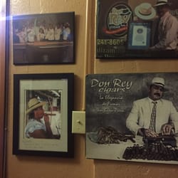 Smoke It...and More - Photos on the wall of owner