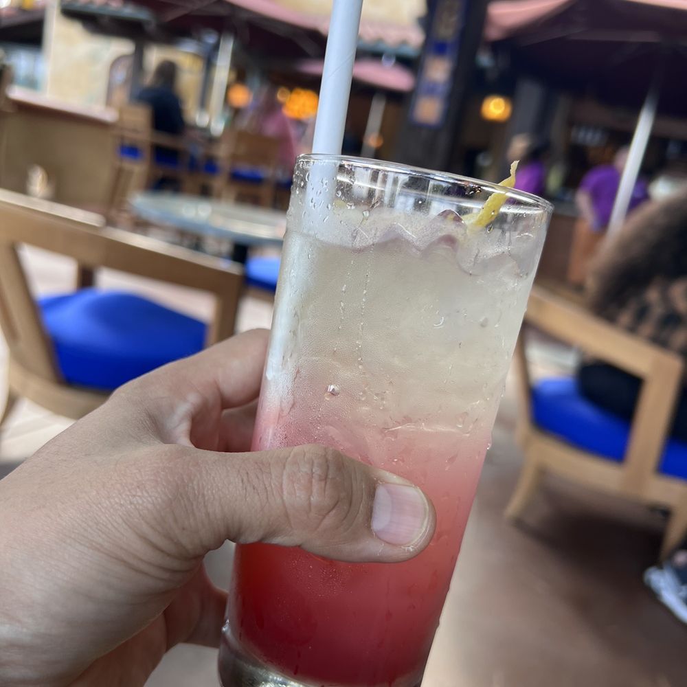 Magic Key Terrace - Magic Key Holder Dining - Avalon Cooler: Tito's Vodka, Strawberry Purée, Elderberry Flower Liquor, Sparkling Wine. - Wine Bars Near Me - Anaheim, California