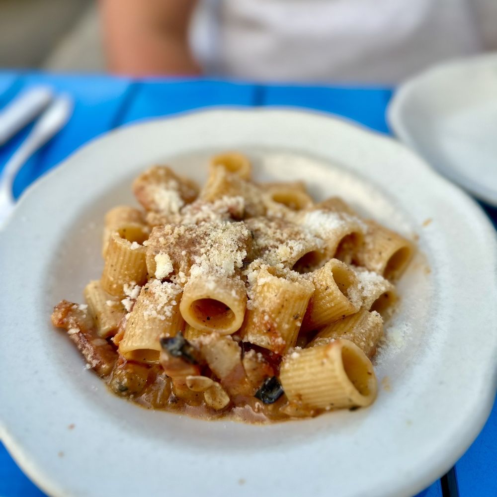 Hyacinth - a plate of pasta on a blue table - Italian Near Me - Saint Paul, Minnesota Hyacinth - a plate of pasta on a blue table - Italian Near Me - Saint Paul, Minnesota