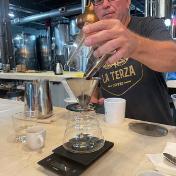 La Terza Artisan Coffee Roasterie - a man pouring coffee - Coffee Roasteries Near Me - Cincinnati, Ohio