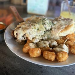 Dunedin New Zealand Eats - The cure- off their Brunch menu . Did not disappoint . I also got a side of jam to dip the Biscuit into .