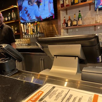 Beer Union - a man behind a bar counter - Beer Bar Near Me - Grapevine, Texas Beer Union - a man behind a bar counter - Beer Bar Near Me - Grapevine, Texas