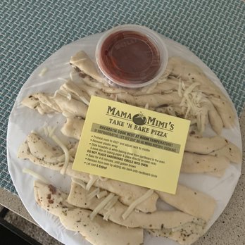 Mama Mimi's Take 'N Bake Pizza - Clintonville - Columbus, OH - a plate of pizza - Pizza Near Me - Columbus, Ohio Mama Mimi's Take 'N Bake Pizza - Clintonville - Columbus, OH - a plate of pizza - Pizza Near Me - Columbus, Ohio