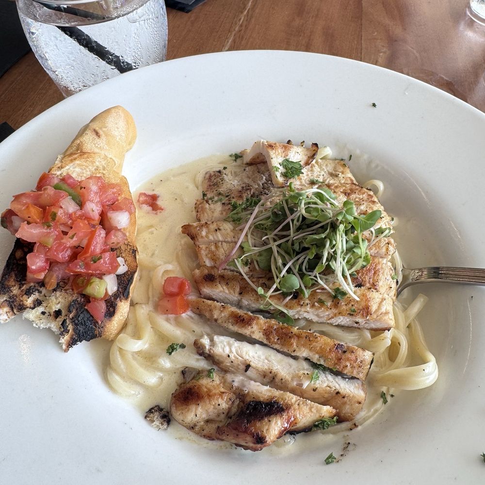 This place is absolutely amazing! everything was so delicious!I ate the Alfredo fettuccine with chicken. Our server, Carla was amazing! This place is absolutely amazing! everything was so delicious!I ate the Alfredo fettuccine with chicken. Our server, Carla was amazing!