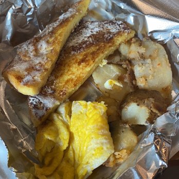 Stack'em High Pancakes & So Forth - Leftover French toast meal. Wasn't a fan of the potatoes or eggs - Pancakes Near Me - Kitty Hawk, North Carolina