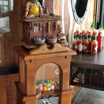Circle Hook Fish - Love the gum ball dispenser. Another great detail in the decor of this restaurant! - Seafood Near Me - Newport Beach, California