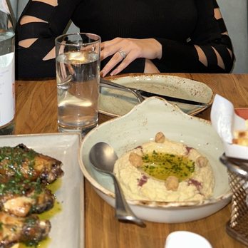 Taverna Veranda - For dessert we go the wings and hummus which were delicious! - Mediterranean Near Me - Edgewater, New Jersey