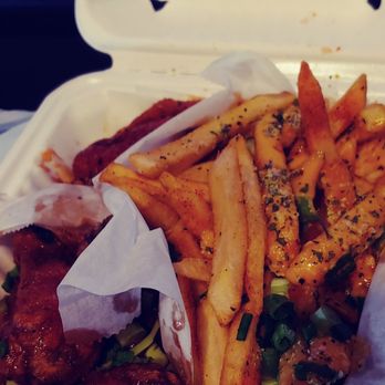 Wings 2 Go - Half/half. ATL Special + Zesty Katsu wings with. Lemon Pepper Cheese Fries. - Chicken Wings Near Me - Inglewood, California