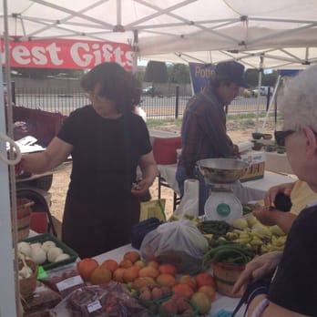 Harvest Gifts - a group of people at a farmers market - Arts & Crafts Near Me - Albuquerque, New Mexico