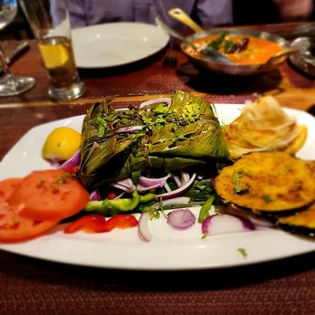 Chola - Meen Polichattu: Kerala Banana Leaf masala spiced fish. Fantastic. - Indian Near Me - New York, New York Chola - Meen Polichattu: Kerala Banana Leaf masala spiced fish. Fantastic. - Indian Near Me - New York, New York