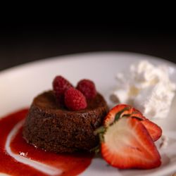 Six Star Chef - Dark chocolate lava cake, strawberry coulis