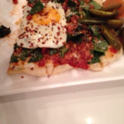 Void Food Truck - Pizza con un huevo estrellado arriba.