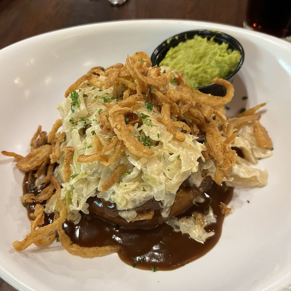Celtic Meatloaf. Potatoes topped with meatloaf. Creamed cabbage and onion straws on top of that. Smashed peas (soooo good) on the side.