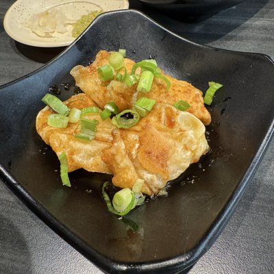 Kura Revolving Sushi Bar by null