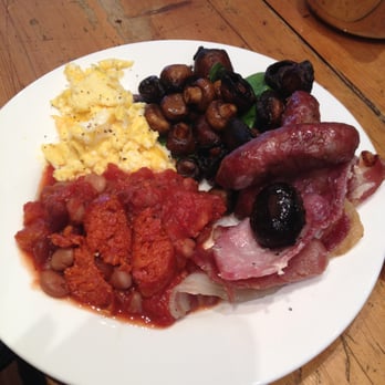 Niven's - Scrambled eggs, sausage, bacon, tomato and beans!  I gave my mom all my mushrooms.  The beans were SO good! - Sandwiches Near Me - London, XGL