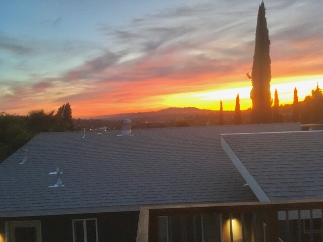 Slide of Mike's Roofing & Building