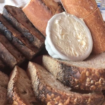 Le Diplomate - Bread basket! Cranberry walnut, sourdough, and baguette with fresh butter - Brasseries Near Me - Washington, DC, District of Columbia