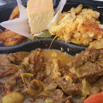 Oley's Kitchen & BBQ - Curry goat, plantains and bake Mac and cheese.. - Soul Food Near Me - Orlando, Florida Oley's Kitchen & BBQ - Curry goat, plantains and bake Mac and cheese.. - Soul Food Near Me - Orlando, Florida