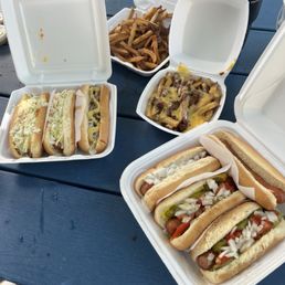 Chicago, Spicy, Slaw, Chili Cheese Slaw, Plain. Large regular fries and small chili cheese fries. Chicago, Spicy, Slaw, Chili Cheese Slaw, Plain. Large regular fries and small chili cheese fries.