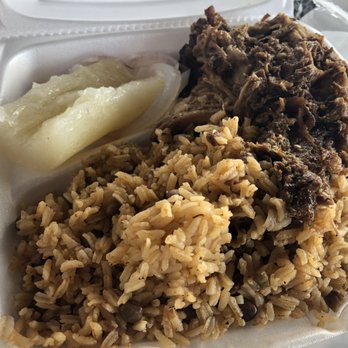 Caribbean Cafe - Roasted Pork, Arroz com gandules, and yuca. - Latin American Near Me - Tampa, Florida