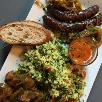 Alpin Bistro - Taboulé, Merguez, Zaalouk w/ house roasted bell pepper hot sauce and lamb - Wine Bars Near Me - Gainesville, Florida Alpin Bistro - Taboulé, Merguez, Zaalouk w/ house roasted bell pepper hot sauce and lamb - Wine Bars Near Me - Gainesville, Florida