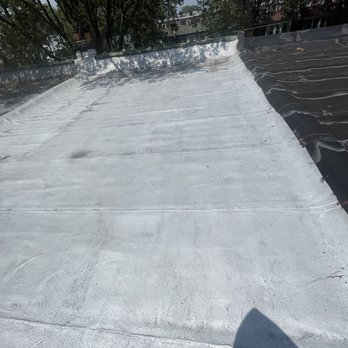 Made in America Roofing - Clean flat roof - Roofing Near Me
