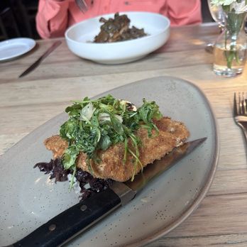 La Colline - Schnitzel with red cabbage. Nice greens on top. - Cocktail Bars Near Me - Castroville, Texas