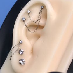 KIVA Fine Jewelry & Body Piercing - One of the displays with some gold chains made in house.