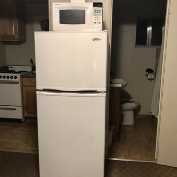 Evergreen Motel - Equipped with refrigerator, microwave, and ice bucket. - Hotels Near Me - West Yellowstone, Montana Evergreen Motel - Equipped with refrigerator, microwave, and ice bucket. - Hotels Near Me - West Yellowstone, Montana