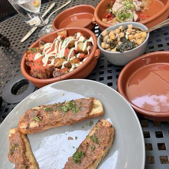 tonica - Dinner tapas; pan con tomate with fresh grated tomato, chick pea and spinach, patatas bravas, and pork tenderloin - Tapas/Small Plates Near Me - Memphis, Tennessee tonica - Dinner tapas; pan con tomate with fresh grated tomato, chick pea and spinach, patatas bravas, and pork tenderloin - Tapas/Small Plates Near Me - Memphis, Tennessee