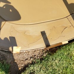 Gladys Lopez & Family landscaping & Maintenance - Mesa buff concrete with stamp dolphin in the border