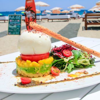 White Eivissa - Burrata salad with black olive's tapenade and gresini - Mediterranean Near Me - Ibiza, PM White Eivissa - Burrata salad with black olive's tapenade and gresini - Mediterranean Near Me - Ibiza, PM