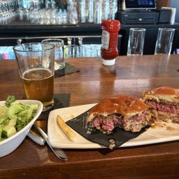 Burger, salad and a beer for a great lunch.