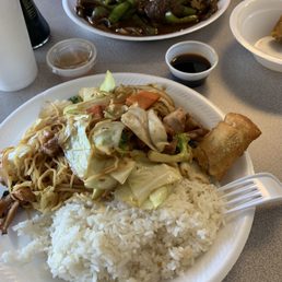 a plate of rice and vegetables a plate of rice and vegetables