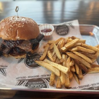 Left Coast Brewing - Brisket sandwich and fries - Distilleries Near Me - Ontario, California Left Coast Brewing - Brisket sandwich and fries - Distilleries Near Me - Ontario, California