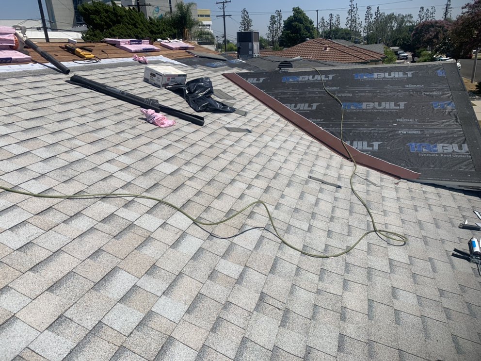 Slide of Maven Roofing Company