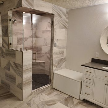 Enderby Contractors - a bathroom with a walk in shower - Drywall Installation & Repair Near Me - Midland, Texas Enderby Contractors - a bathroom with a walk in shower - Drywall Installation & Repair Near Me - Midland, Texas