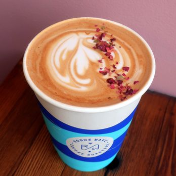 Rogue Wave Coffee - a cup of coffee on a table - Coffee & Tea Near Me - Edmonton, Alberta