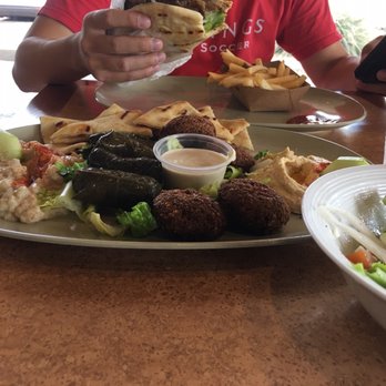 Pita Island - Wow!!! So delicious and fresh!!! My new favorite spot! Falafel platter comes with a side salad. My husband loves the lamb Gyro! - Mediterranean Near Me - Gilbert, Arizona