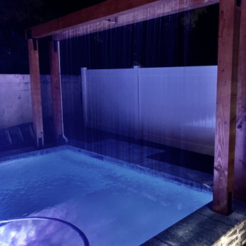Sunset Outdoor Creations - Rain decent feature at night - General Contractors Near Me - Corona, California Sunset Outdoor Creations - Rain decent feature at night - General Contractors Near Me - Corona, California