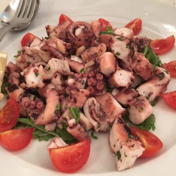 Malvasia - Can't get enough Sicilian tomatoes in octopus salad - Sicilian Near Me - Taormina, Maine