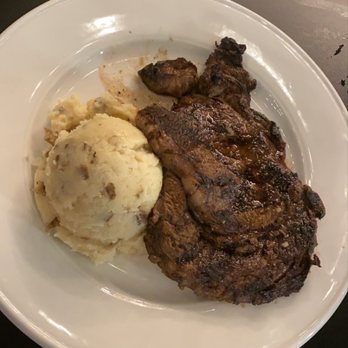 Michael's Restaurant - 12 oz Delmonico Steak and Garlic Mashed Potatoes - Steakhouses Near Me - Birmingham, Alabama Michael's Restaurant - 12 oz Delmonico Steak and Garlic Mashed Potatoes - Steakhouses Near Me - Birmingham, Alabama