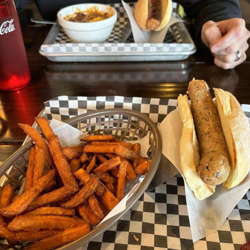 Chicken Basil with really good sweet potato fries, in the back chili and brisket dog