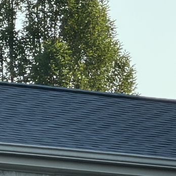 Presidential Roofing - Roof with black onyx tiles - Roofing Near Me - Niles, Illinois Presidential Roofing - Roof with black onyx tiles - Roofing Near Me - Niles, Illinois