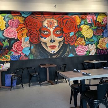 La Cantinita - a mural of a woman with flowers - Mexican Near Me - Massapequa Park, New York