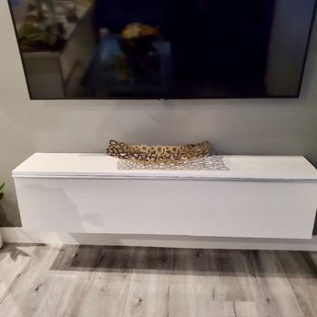 Integral Homes - Custom floating tv stand. - Cabinetry Near Me