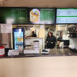 Menus to place your order and an open kitchen. Wonderful staff.