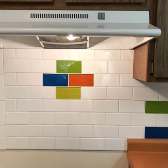 Romanoff Renovations - a colorful tile backsplash in a kitchen - Flooring Near Me - Fayetteville, Arkansas Romanoff Renovations - a colorful tile backsplash in a kitchen - Flooring Near Me - Fayetteville, Arkansas